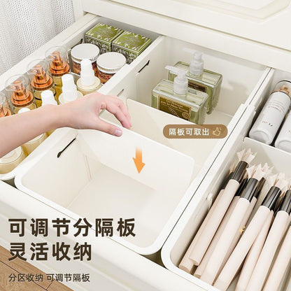 The storage box drawer is divided into built-in retractable rectangular compartments for cosmetics, lipsticks, snacks and small sundries