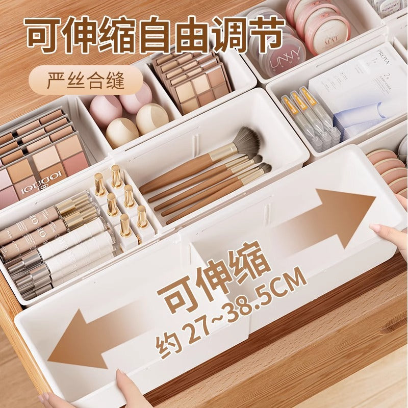 The storage box drawer is divided into built-in retractable rectangular compartments for cosmetics, lipsticks, snacks and small sundries