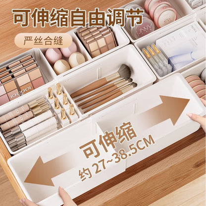 The storage box drawer is divided into built-in retractable rectangular compartments for cosmetics, lipsticks, snacks and small sundries
