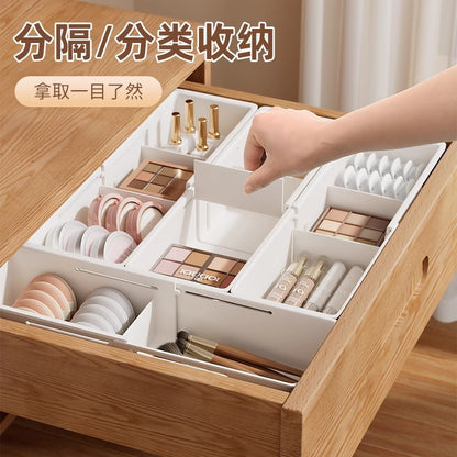 The storage box drawer is divided into built-in retractable rectangular compartments for cosmetics, lipsticks, snacks and small sundries