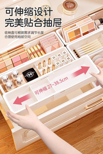 The storage box drawer is divided into built-in retractable rectangular compartments for cosmetics, lipsticks, snacks and small sundries