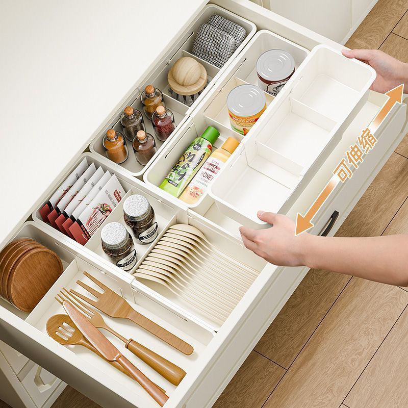 The storage box drawer is divided into built-in retractable rectangular compartments for cosmetics, lipsticks, snacks and small sundries